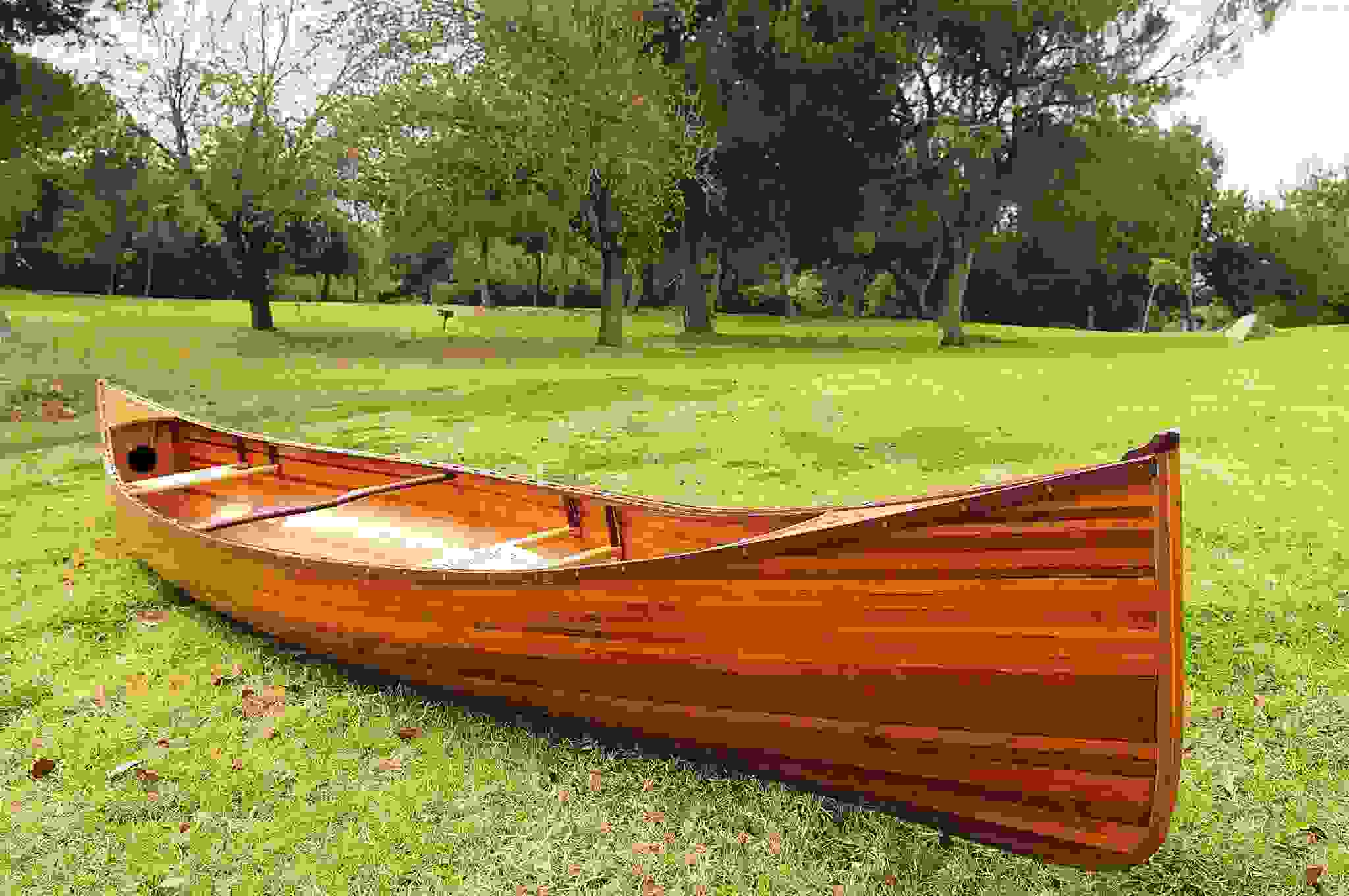 35.5" x 216" x 27" Wooden Canoe