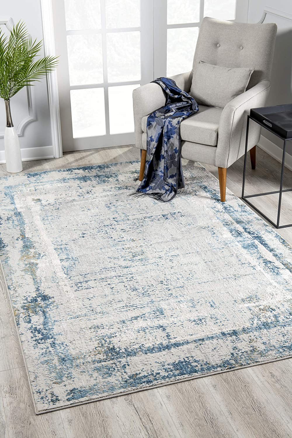 8 x 11 Ivory and Blue Abstract Distressed Area Rug