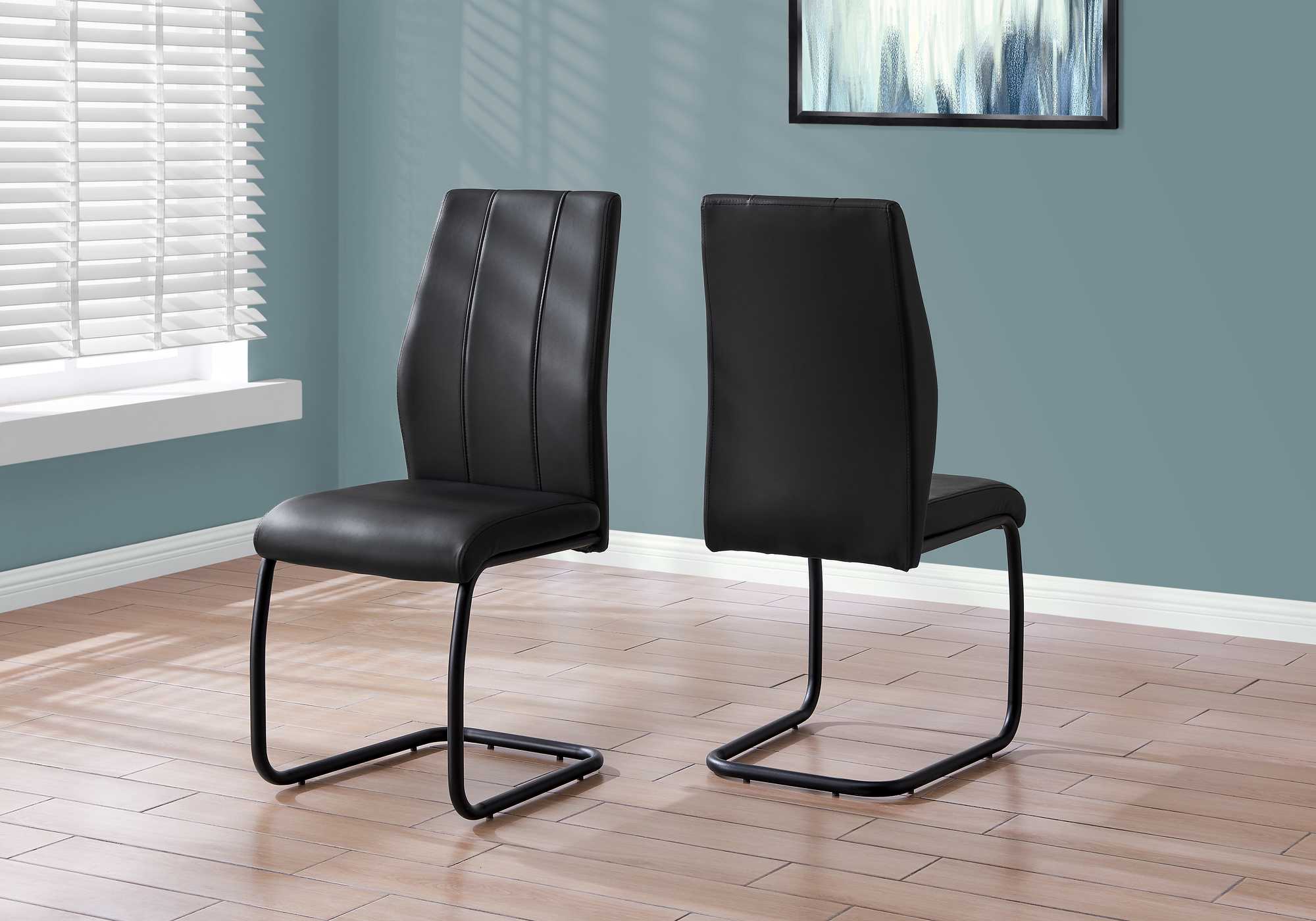 Two 77.5" Black Leather Look Chrome Metal and Foam Dining Chairs