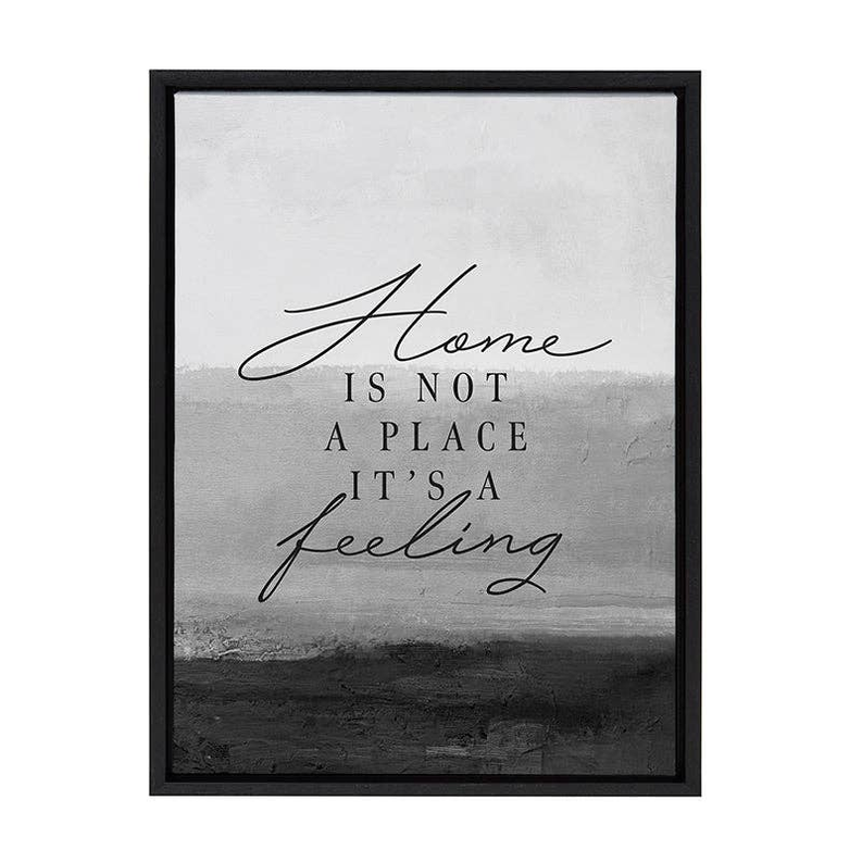 Home is not a place it's a feeling /  Framed Canvas