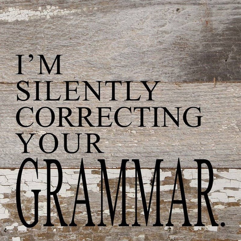 I'm silently correcting your gramma... Wall Sign