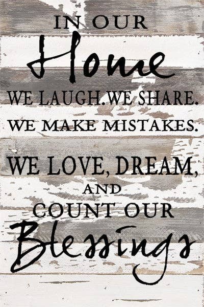 In our home we laugh, we share, we make... Wall Sign