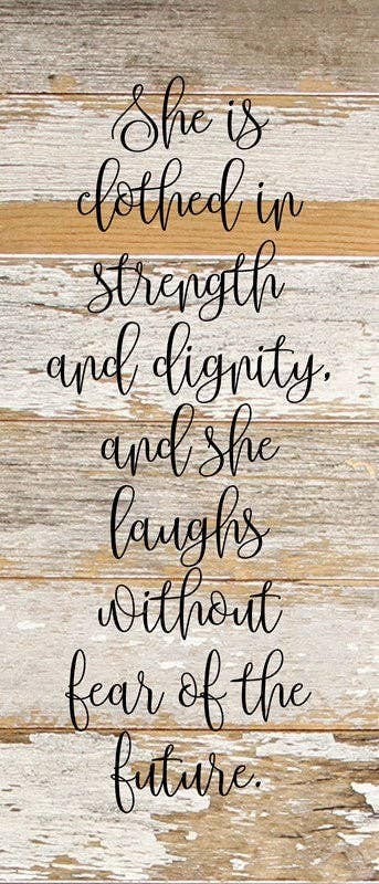 She is clothed in strength and dign... Wall Sign