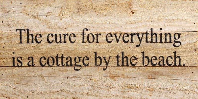 The cure for everything is a cottage by... Wall Sign