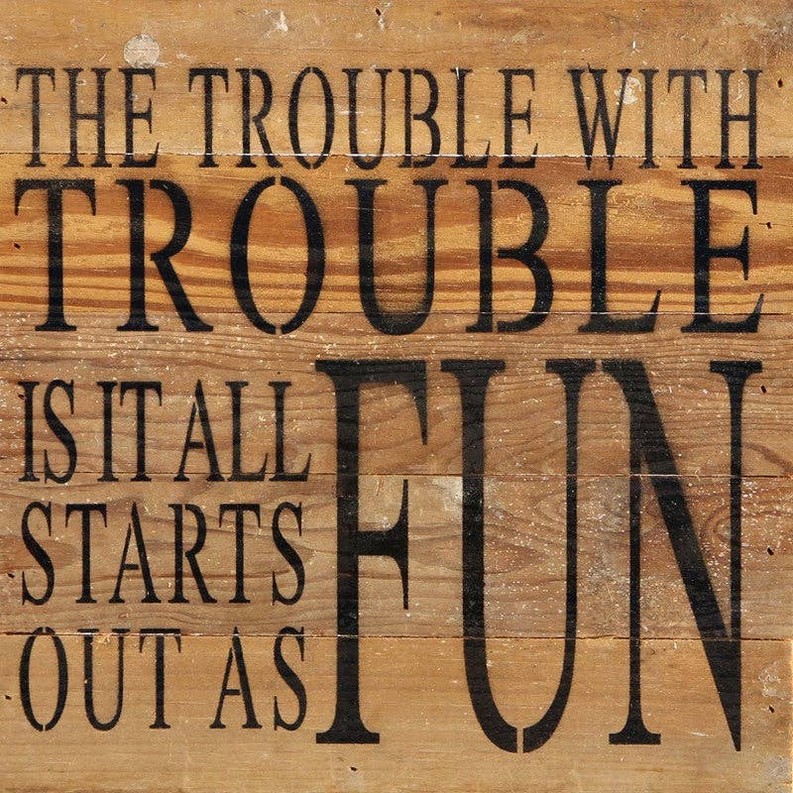 The trouble with trouble is it all... Wall Sign