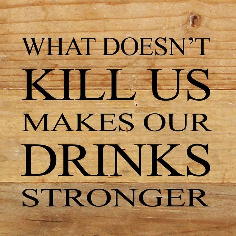 What doesn't kill us makes our drinks st... Wall Sign