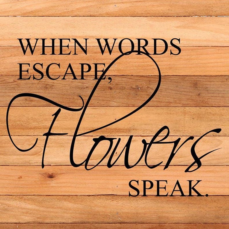 When words escape, flowers speak... Wall Sign