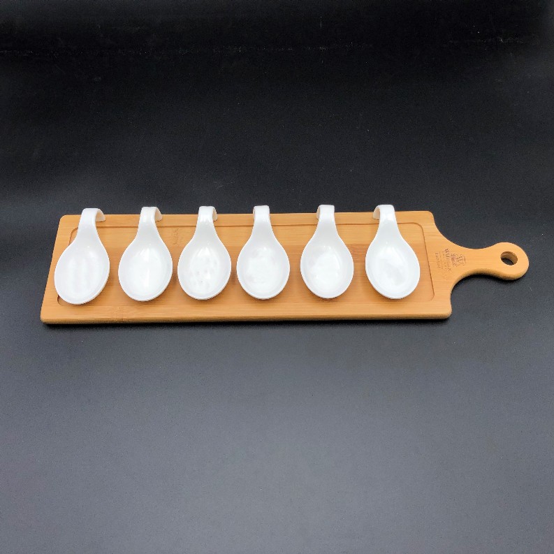 Small party serving tray with 6 shooter spoons on an 18 inch bamboo board to match